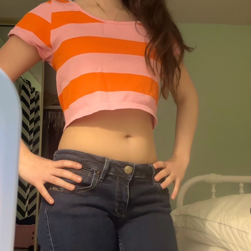 orange and pink striped shirt